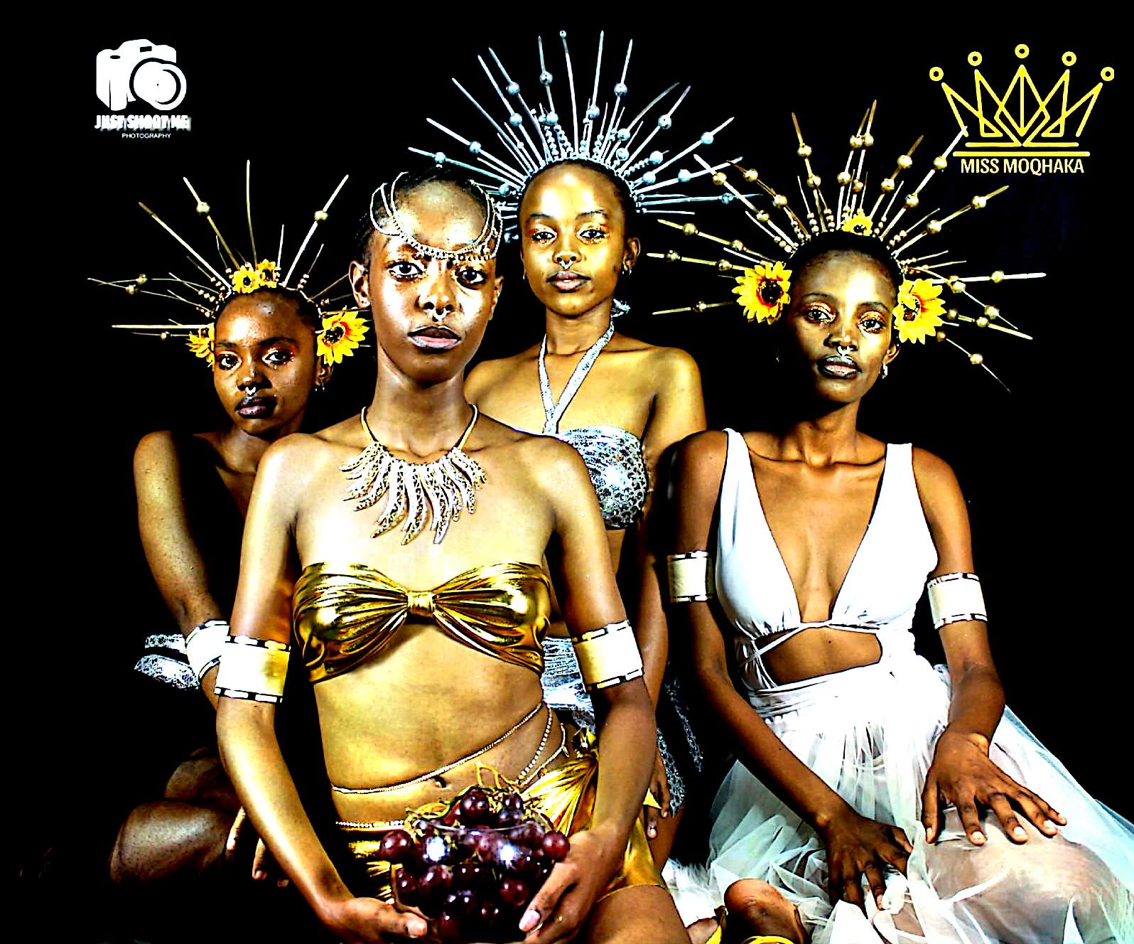 Miss Moqhaka finalists in gold couture on stage