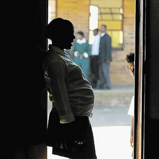 A young expectant mother supported by the programme